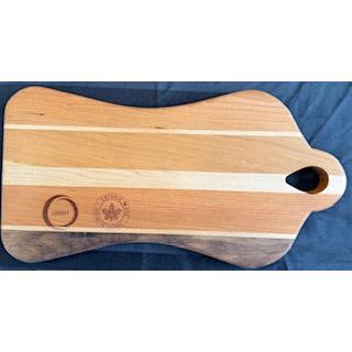 An hourglass-shaped serving board with engraved text 'Wine & Cheese' accompanied by an image of a wine glass.