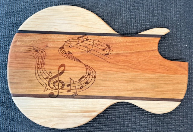 "Designer wooden cutting board from Unique Boutique by Helen, uniquely shaped for stylish chefs."