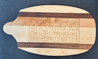 &quot;Artistic shaped board by UBBH, serving as both a cutting surface and a conversation piece.&quot;